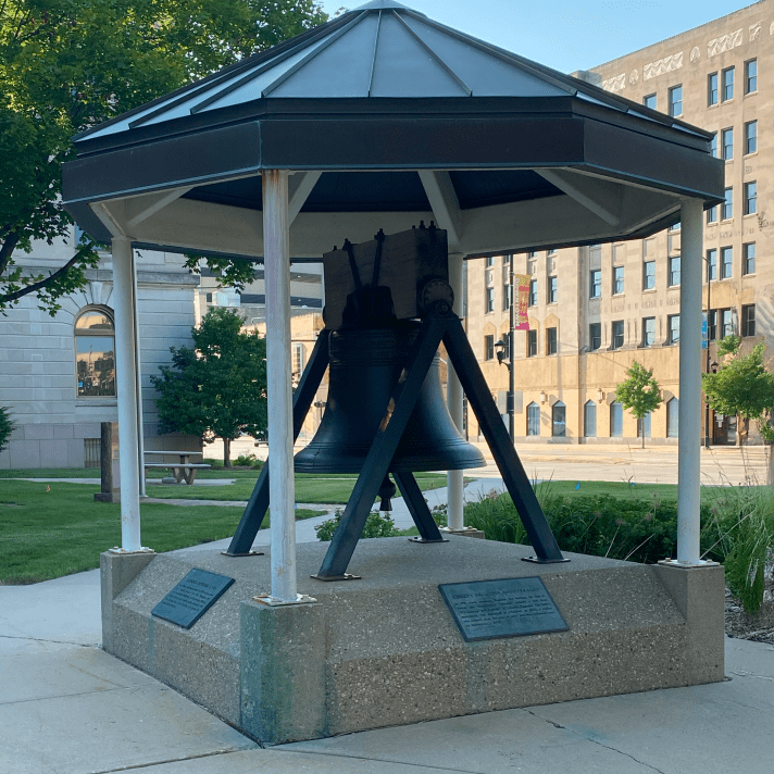 a replica of the liberty bell located in downtown Green Bay
